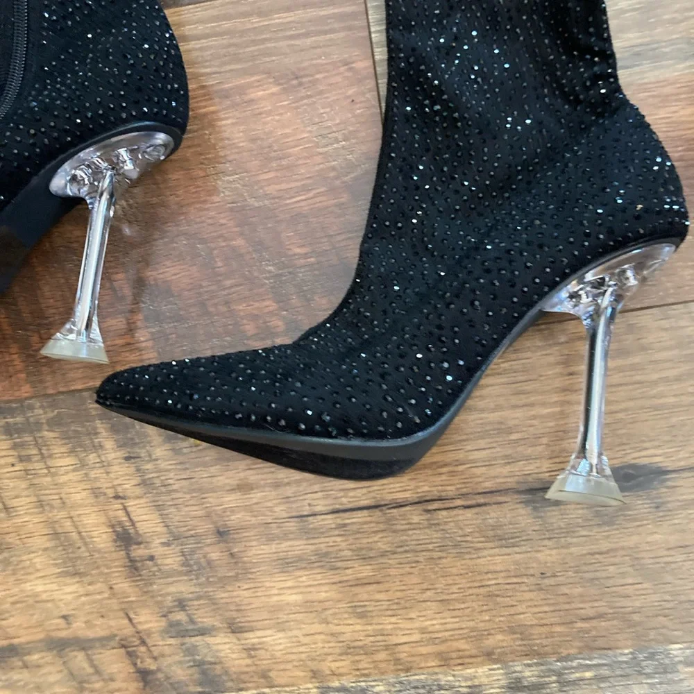 Elegant Black Over-the-Knee Boots with Clear Heels